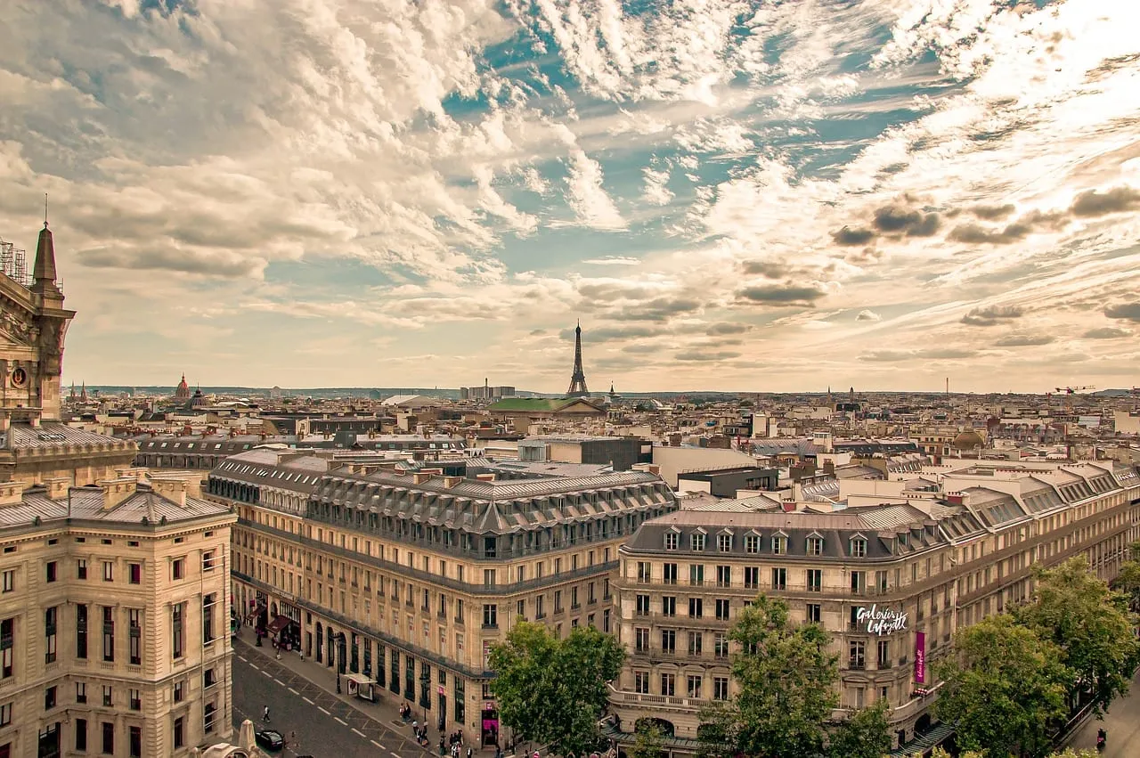 Paris rooftops with the Eiffel Tower in the distance