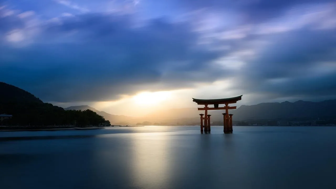 The torii at dusk under a dark sky