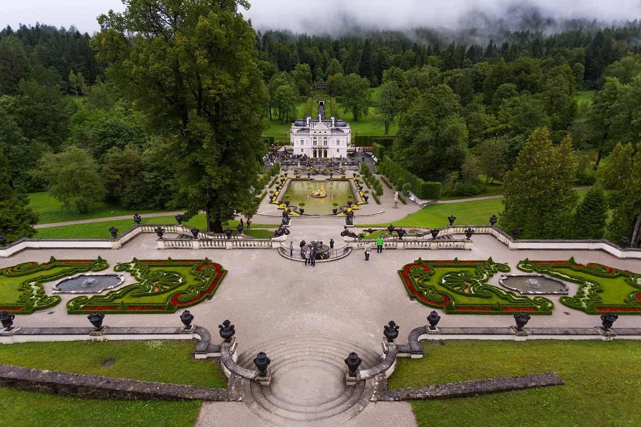 The formal gardens and the palace seen from the hillside