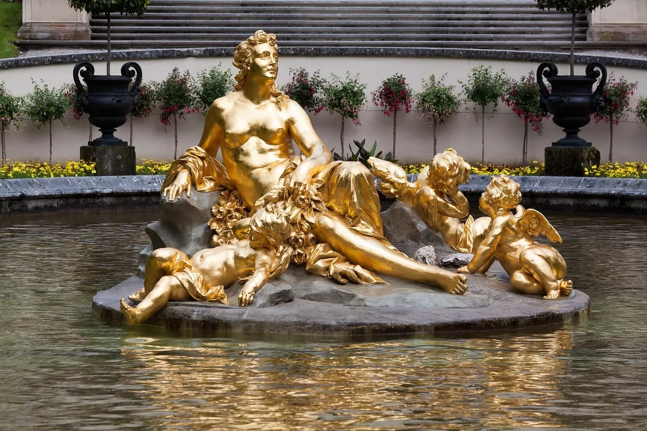 The gilded figure group in the fountain pool