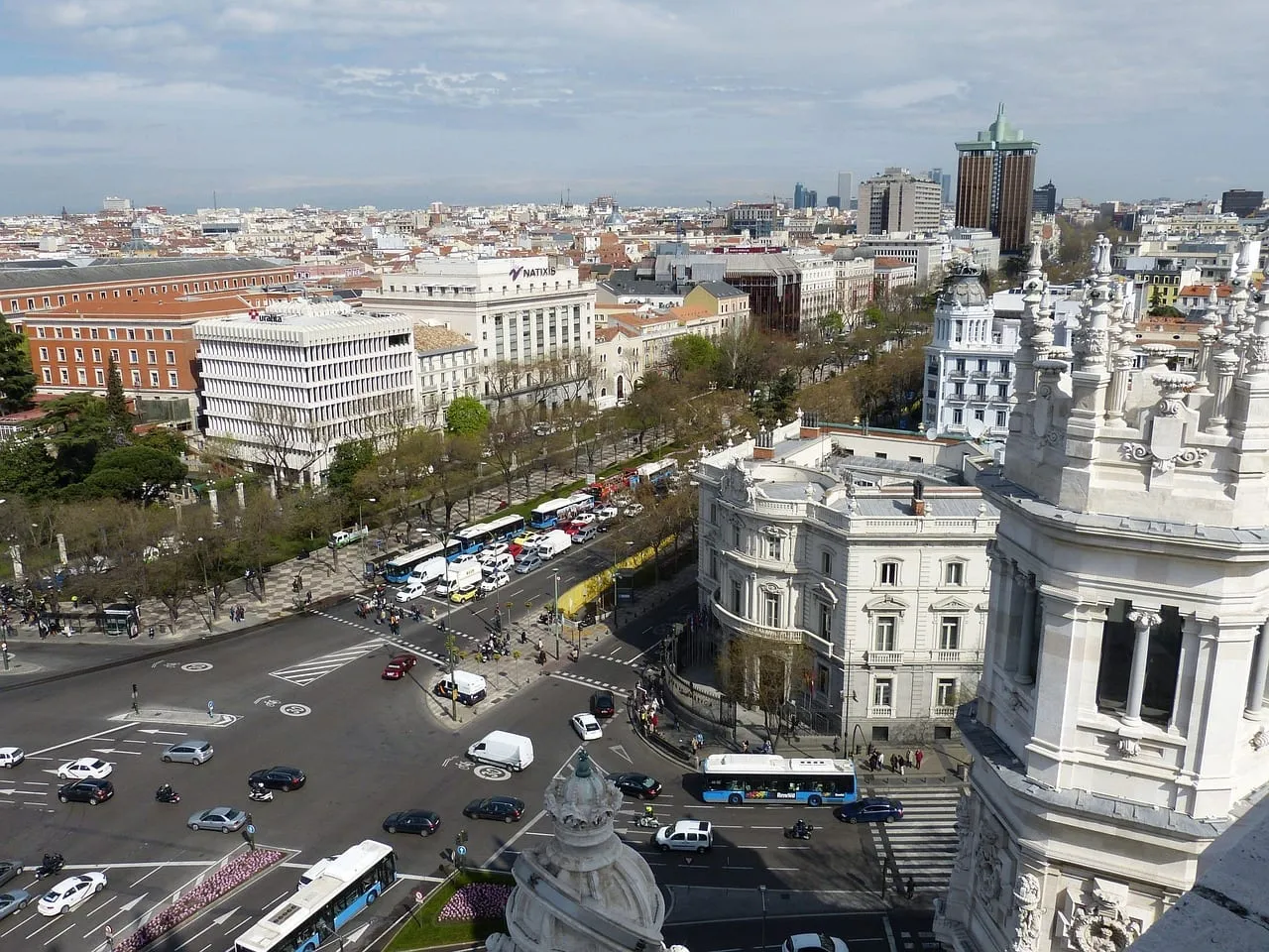 Plaza de Cibeles and the Cibeles Palace seen from above, with traffic below