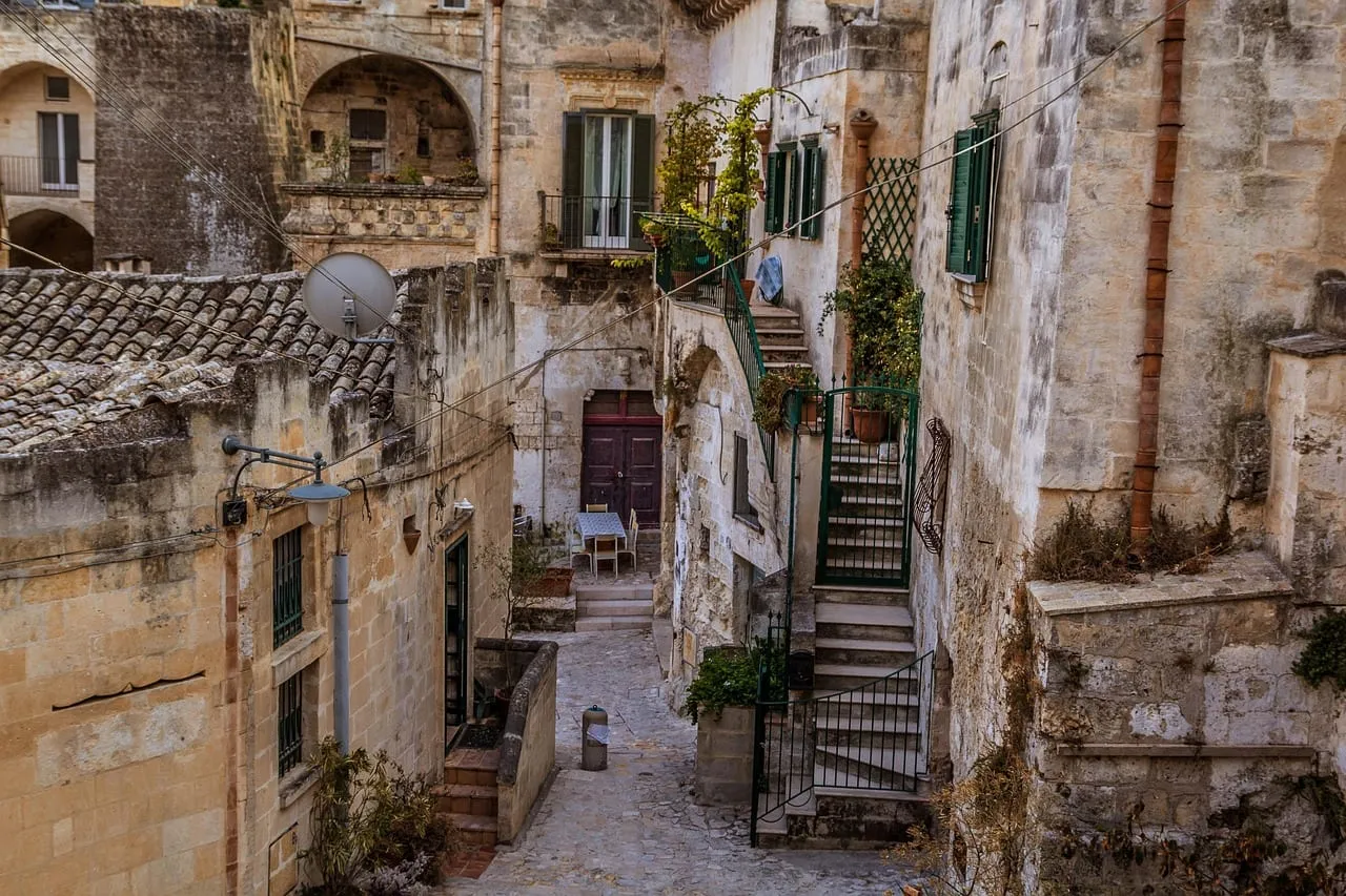 A stepped lane between old stone houses in the Sassi