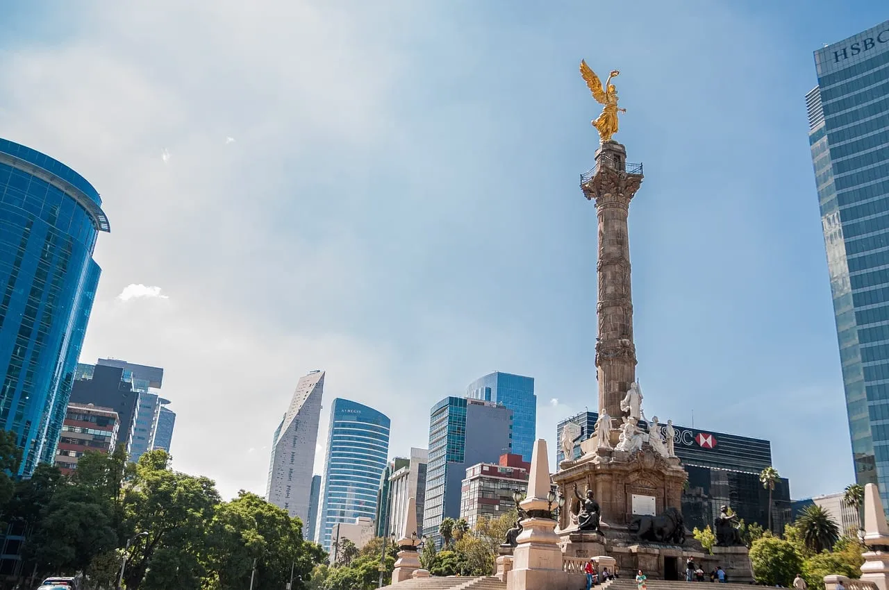 The Angel of Independence on Paseo de la Reforma, with office towers behind