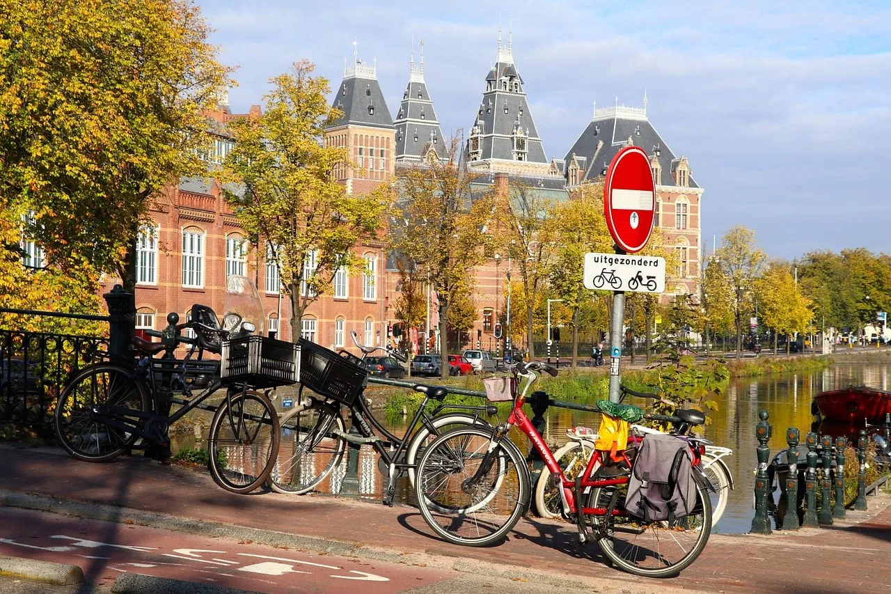 The museum seen across a canal with bicycles