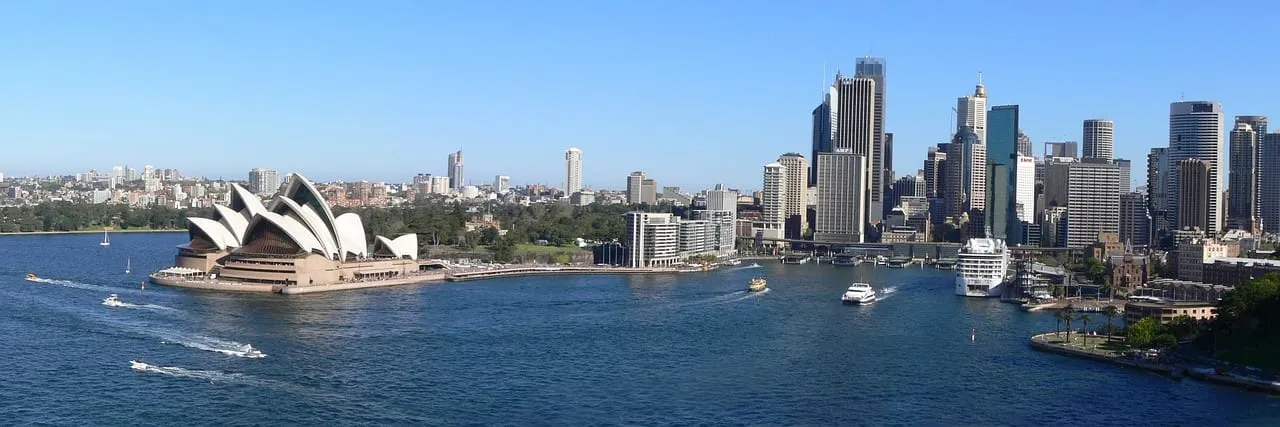 Circular Quay, the Opera House and the city towers from the harbour