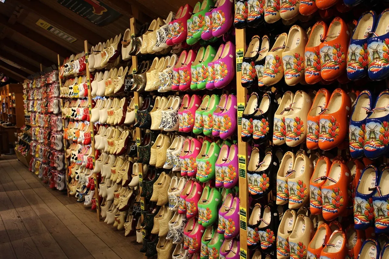 Shelves of painted clogs